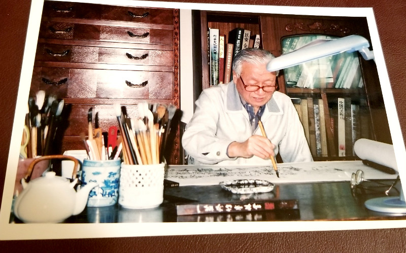 Kim Hak-su drew an ink painting in his studio